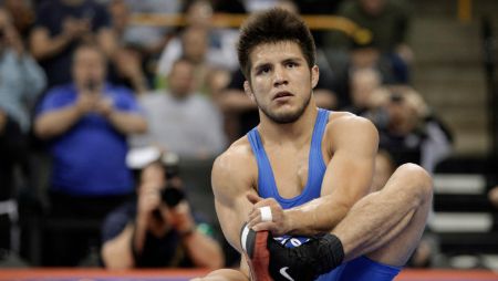 Henry Cejudo in a blue top in the Olympics.